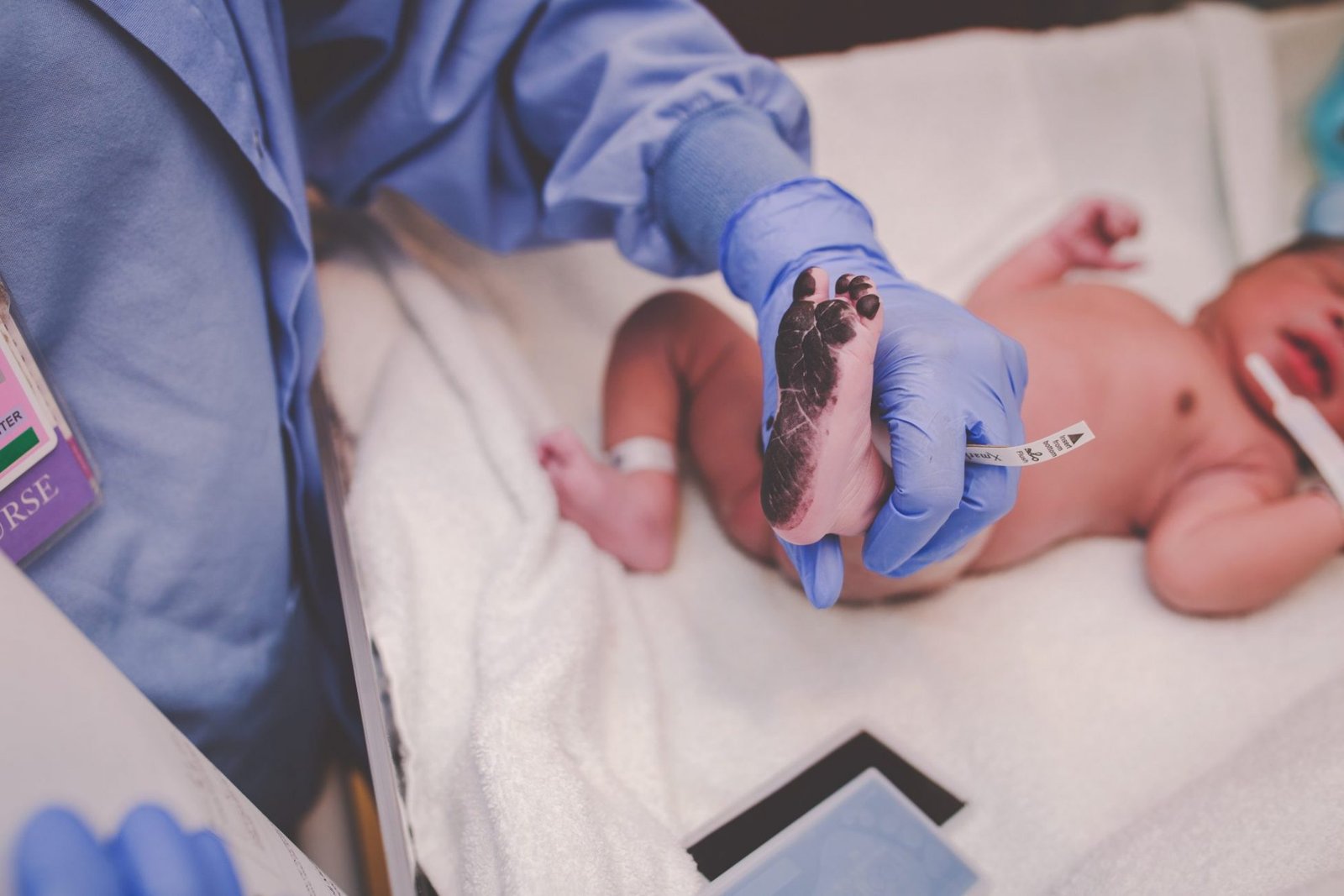 a baby is being examined by a doctor