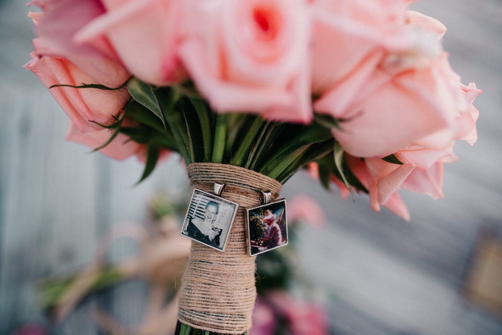 a bouquet of pink roses in a vase