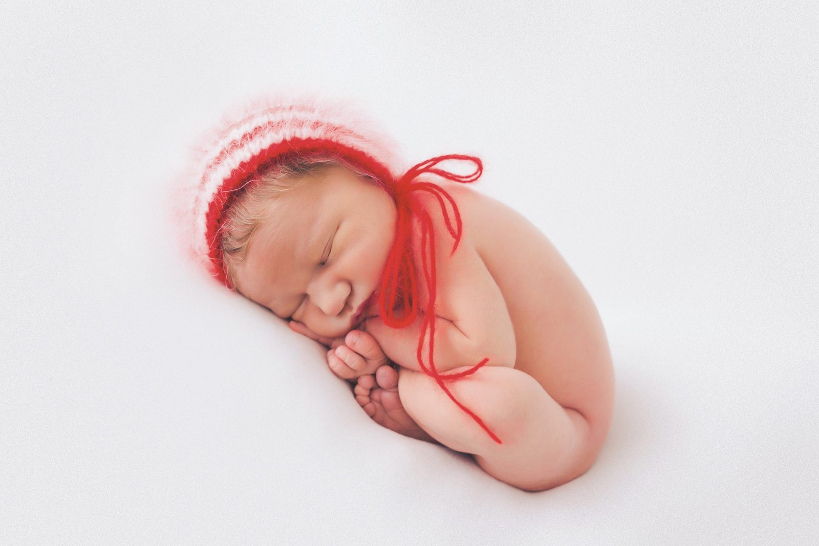 Newborn baby in wooden bowl - Oxnard newborn photographer