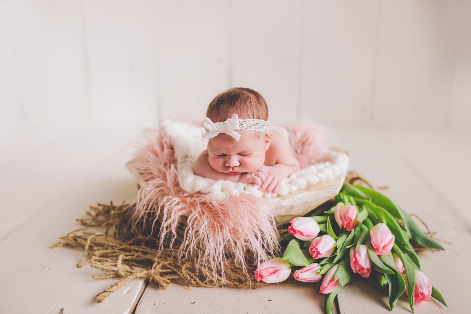 Newborn posed in cream wrap - Ventura County newborn photographer