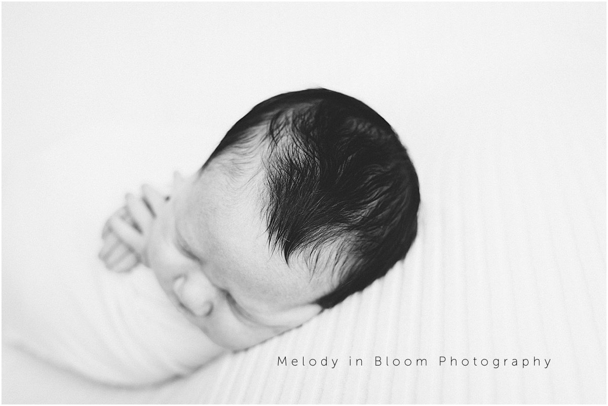 Newborn baby with parents in lifestyle session - Camarillo family photographer