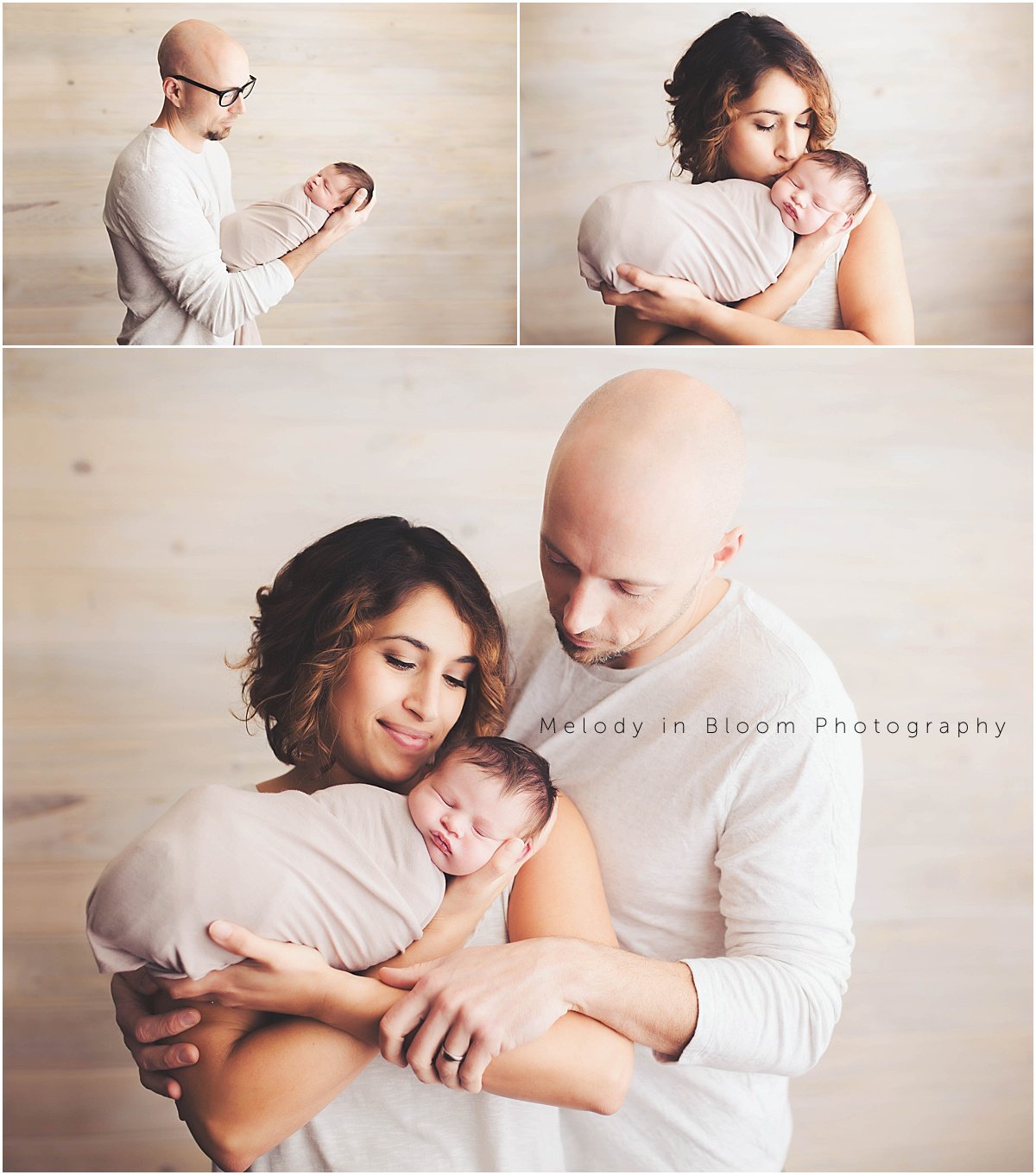 a man and woman holding a baby in their arms