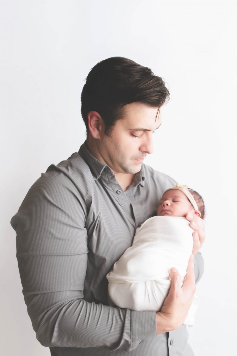 Sleeping newborn wrapped in soft fabrics - Ventura County photographer