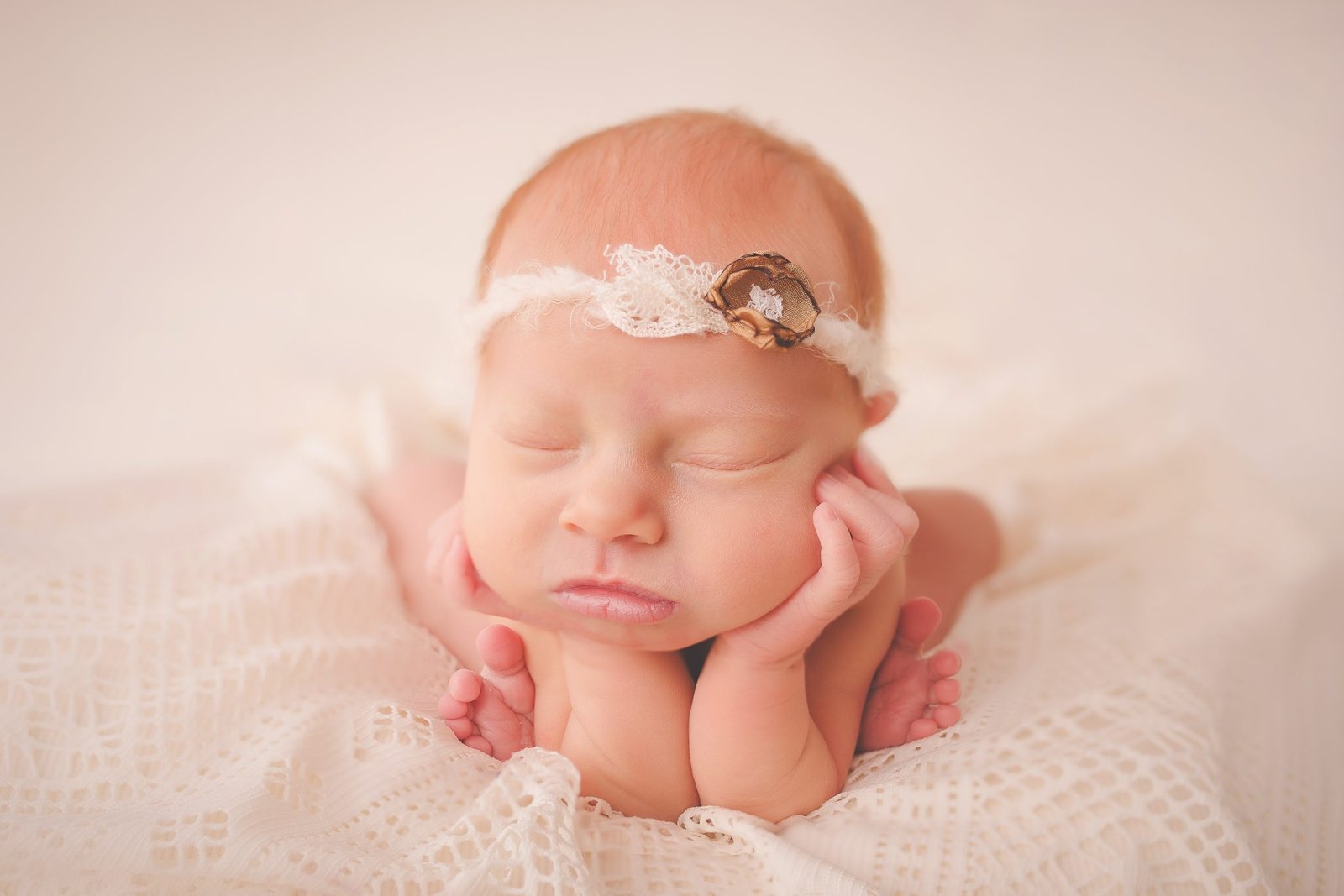 Newborn baby in basket with delicate headband - Oxnard newborn photographer